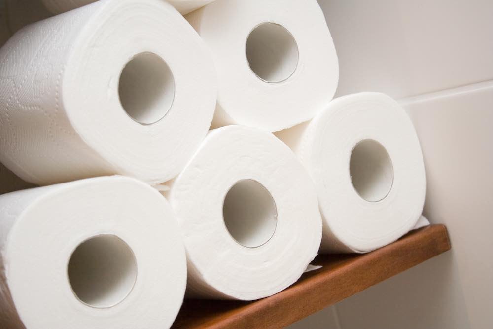 rolls of vegan toilet tissue on shelf